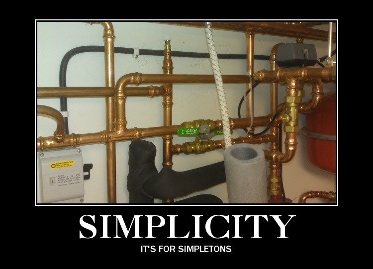 A picture of the plumbing for my heating system with the caption: Simplicity - It's for simpletons. A picture of the plumbing for my heating system with the caption: Simplicity - It's for simpletons.