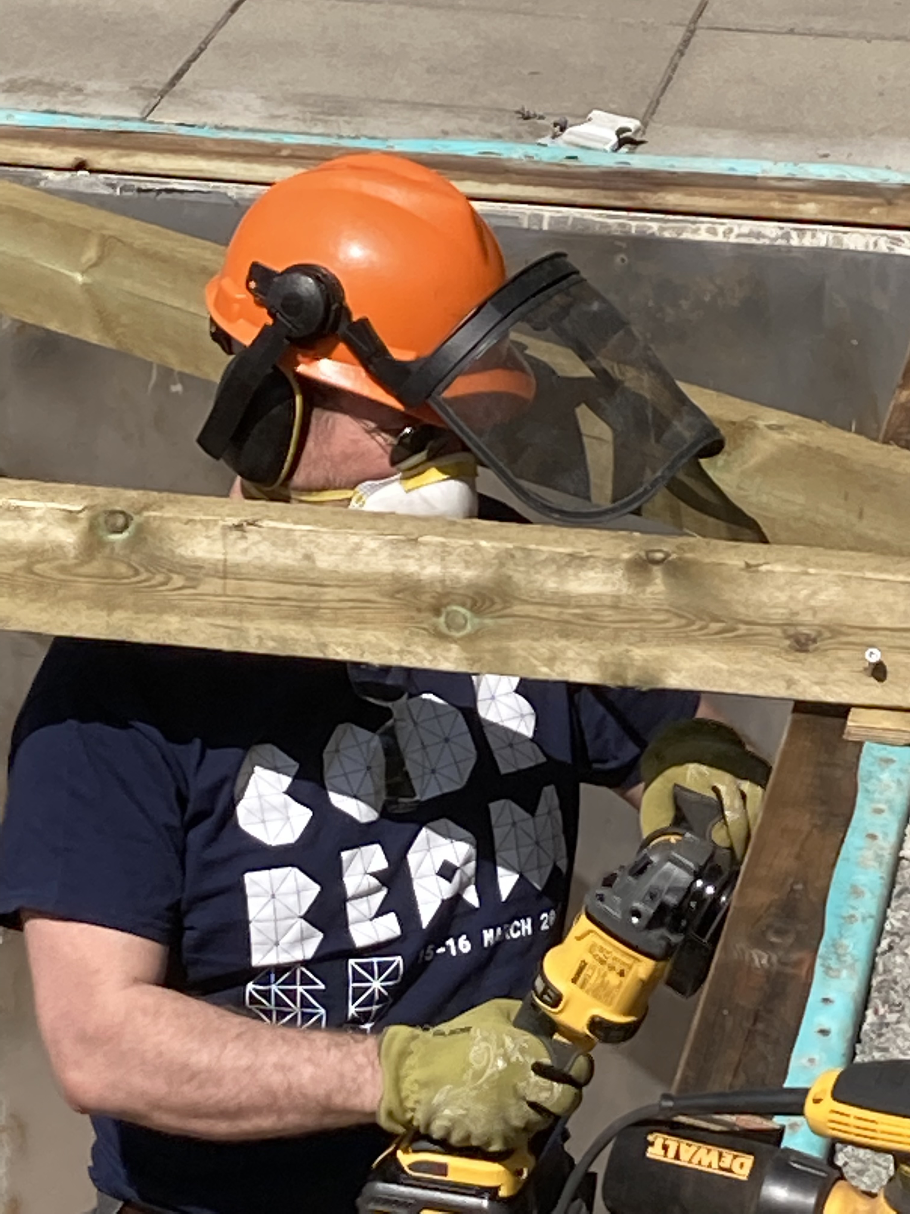 Happi as a worker and poolboy. Happi with
a hardhat working with power tools.
